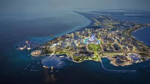 阿布扎比萨迪亚特文化区临海建筑群的黄昏航拍景观